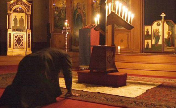 Bowing before the cross